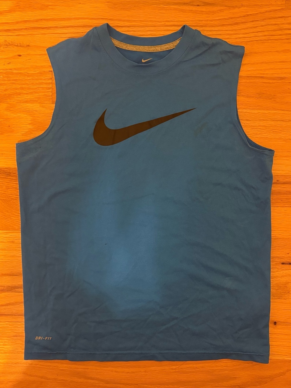 Blue Nike sleeveless dri-fit muscle tee